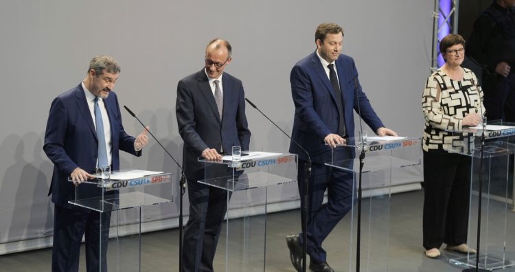 Markus Soeder, chairman of Bavarian¥s Christian Social Union party, Friedrich Merz, Christian Democratic Union party chairman and the Social Democratic Party co-leaders Lars Klingbeil and Saskia Esken, brief the media after reaching an agreement between their parties on a coalition for a new German government at a news conference in Berlin, Germany, Wednesday, April 9, 2025. (AP Photo/Markus Schreiber)