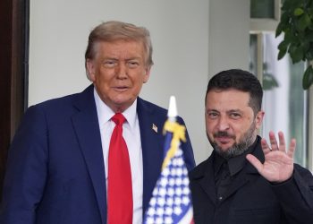 President Donald Trump, left, greets Ukraine's President Volodymyr Zelenskyy as he arrives at the White House, Monday, Aug. 18, 2025, in Washington. (AP Photo/Alex Brandon)