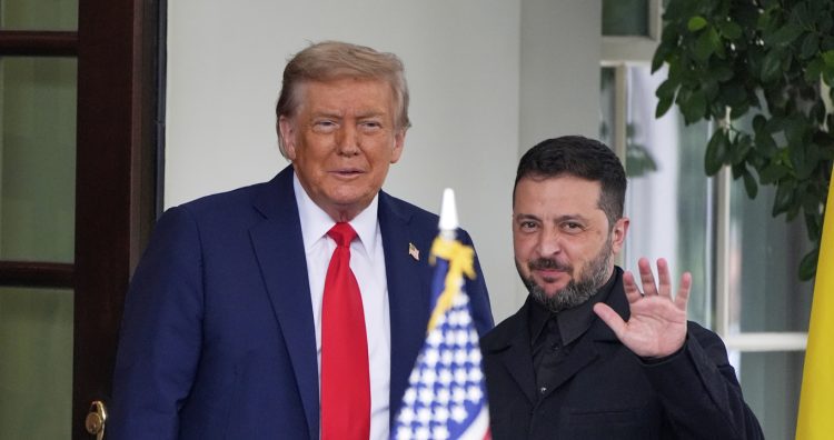 President Donald Trump, left, greets Ukraine's President Volodymyr Zelenskyy as he arrives at the White House, Monday, Aug. 18, 2025, in Washington. (AP Photo/Alex Brandon)
