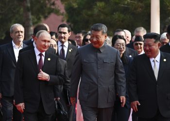 From left in the front row: Russian President Vladimir Putin, Chinese President Xi Jinping and North Korean leader Kim Jong Un walk after a joint photo session of the heads of foreign delegations invited to the military parade to mark the 80th anniversary of Japan's World War II surrender, in Beijing, China, Wednesday, Sept. 3, 2025. (Sergei Bobylev, Sputnik, Kremlin Pool Photo via AP)