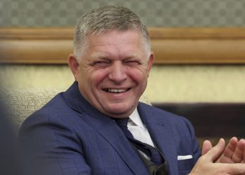 Slovak Prime Minister Robert Fico smiles during his meeting with Russian President Vladimir Putin at the Diaoyutai State Guesthouse in Beijing, China, Tuesday, Sept. 2, 2025. (Alexander Kazakov, Sputnik, Kremlin Pool Photo via AP)