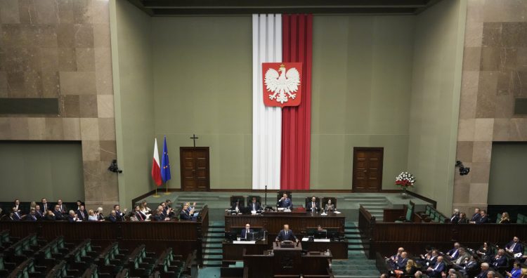 Poland's Prime Minister Donald Tusk addresses the Polish parliament on Wednesday, June 11, 2025, in Warsaw, Poland. (AP Photo/Czarek Sokolowski)